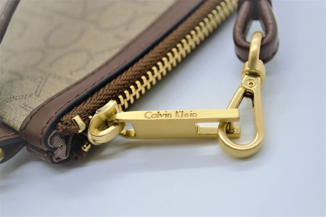 Monogram logo zip top swing bag outlet