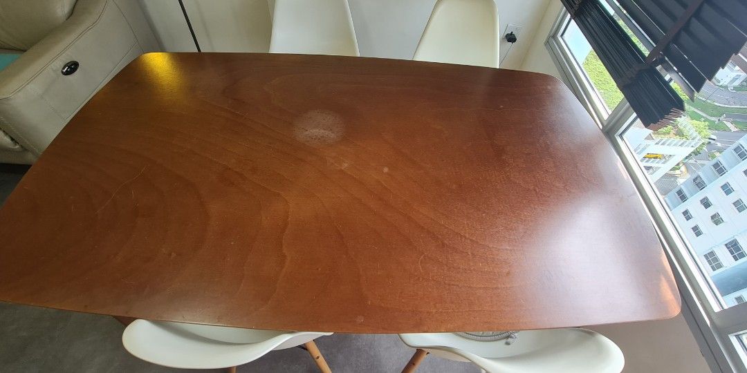 Dining Table (Category: Tables & Sets) located in Singapore. Submitted by resurrected (Listing ID 1195187939, Image 2). Description: 1.5cm length by 87.5cm width wooden dining table in good condition except for a water mark as per 1 picture. non pets non smoke home..