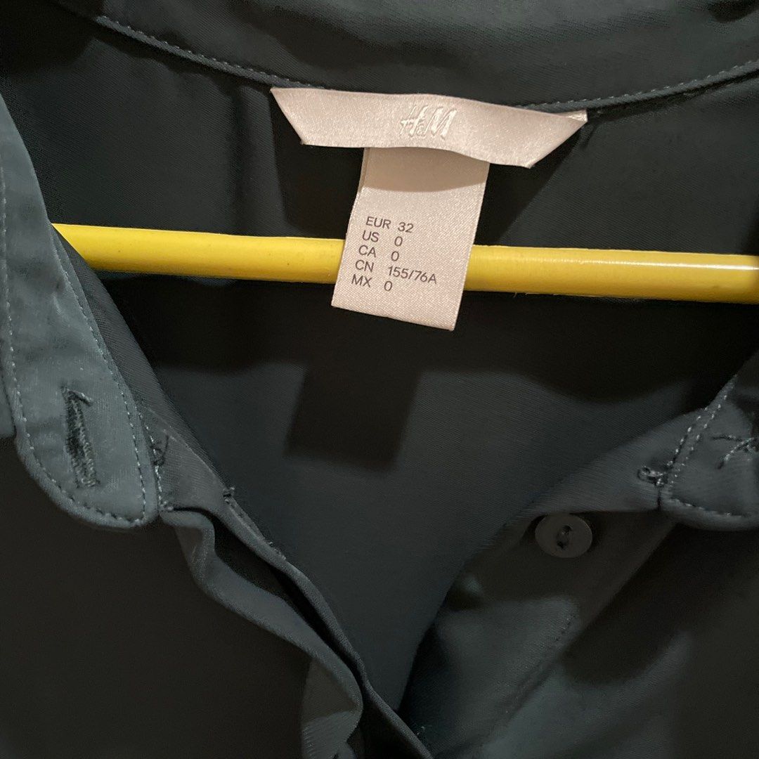 H&M Longsleeves Button Up (Category: Longsleeves) located in Muntinlupa City. Submitted by krishmal (Listing ID 1195182448, Image 3). Description: - Dark blue green color - Fits XS-S - Great for office wear.