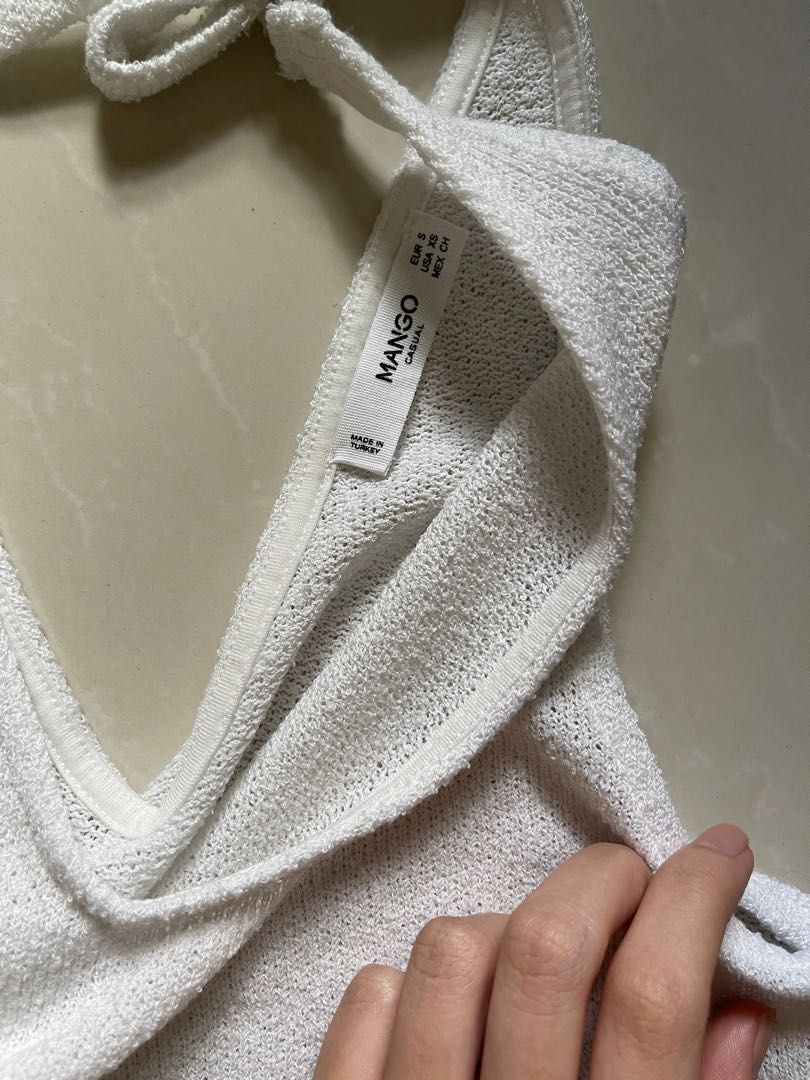 Mango White Textured Tie Knot Sleeveless Top (Category: Sleeveless) located in Quezon City. Submitted by needtodeclutterpls (Listing ID 1195188909, Image 3). Description: Beautiful textured top! No flaws, no yellowing or stains. Size S-XS RFS: decluttering.