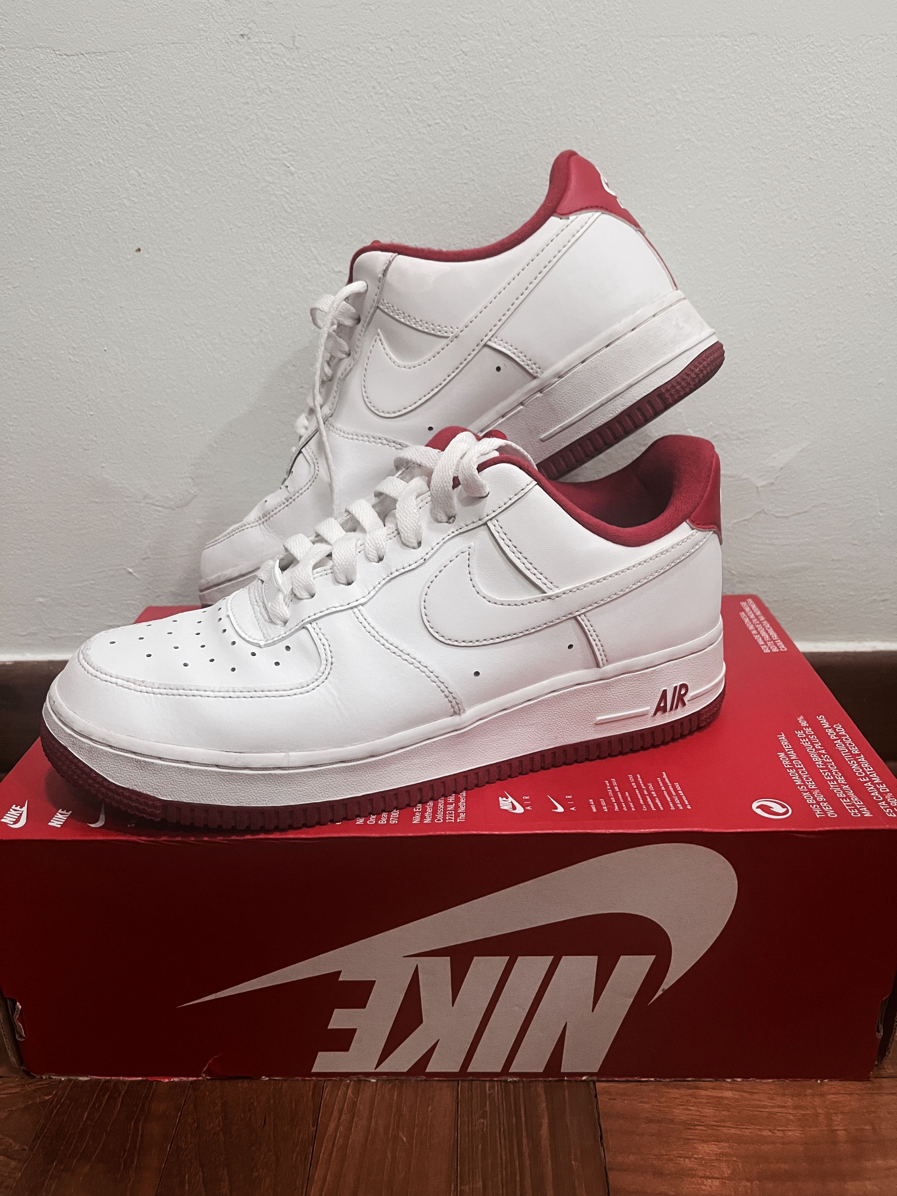 White nike sneakers sales with red swoosh