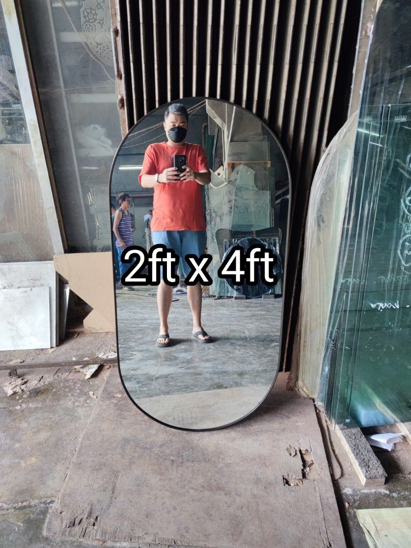 Oval Mirror with frame (Category: Mirrors) located in Malabon City. Submitted by mirrors.ph (Listing ID 1195222583, Image 1). Description: Oval mirror with black aluminum frame and plywood backing. Using 6mm thick copper free lead free mirror. Size: 2ft x 4ft P2160 Add P200 if with back hook. Available colors gold, glossy black, matte black, white and silver aluminum frame. Customize sizes and shapes are welcome..