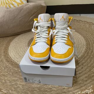 Air Jordan 1 - University Gold (Yellow)