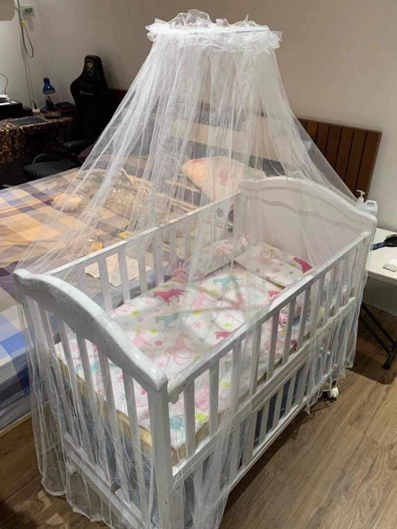 Baby bassinet with mosquito hot sale net