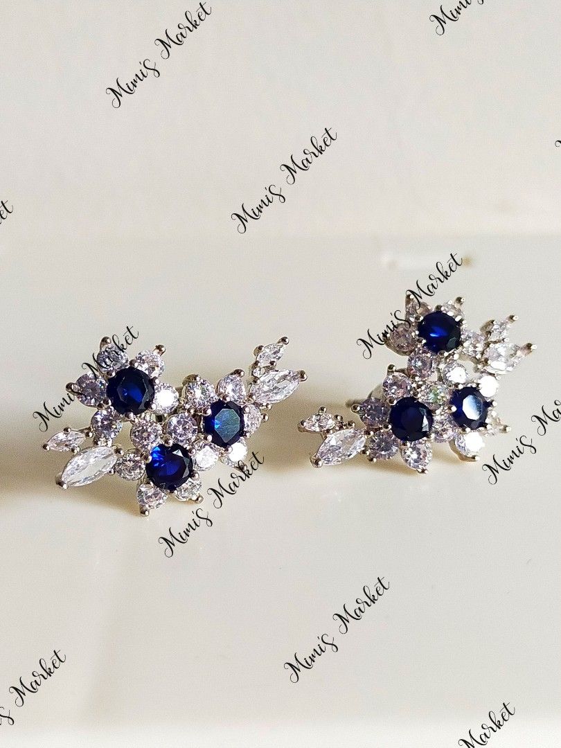 Mimi's Market Flower Crawler Earrings (Category: Earrings) located in Cainta. Submitted by mimitn (Listing ID 1195586550, Image 1). Description: ☑️ Premium Quality ☑️ white Gold Plating. ☑️ Base Metal Vermiel (copper /silver mixture) ☑️ Durable, hypoallergenic, nickel cadmium free. ☑️ long lasting color retention long lasting wear. ☑️ Halo stones using Our High Quality Simulated Diamonds💎 ☑️ Lab Created Blue Sapphires ☑️ Please follow our care t