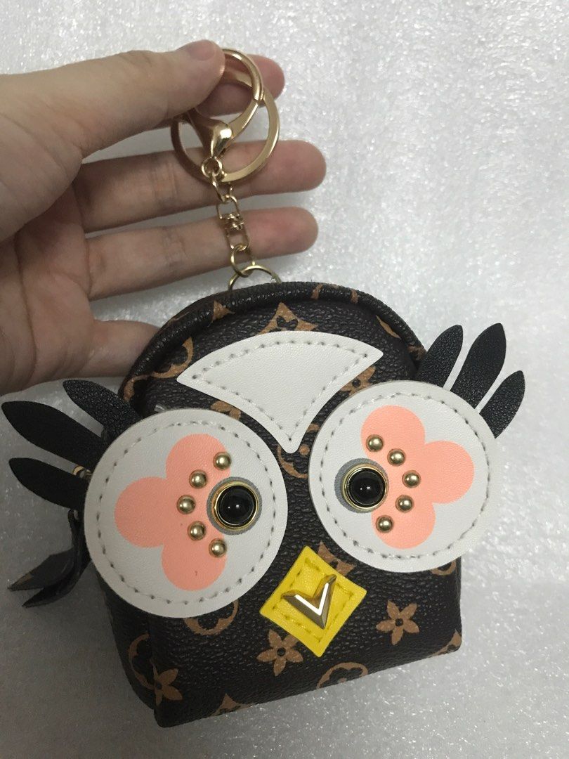 Louis vuitton owl coin clearance purse