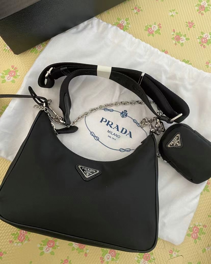 PRADA A black shoulder bag with a small coin purse, Women's Fashion, Bags &  Wallets, Cross-body Bags on Carousell