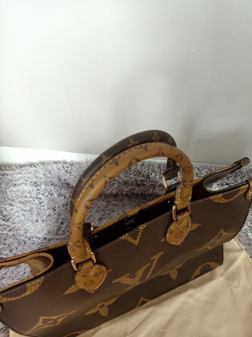 Preloved lv otg large (Category: Luxury Bags & Wallets) located in Cebu City. Submitted by day.98 (Listing ID 1195384753, Image 2). Description: from japan surplus genuine leather two way bag no flaws codes with dust bag.