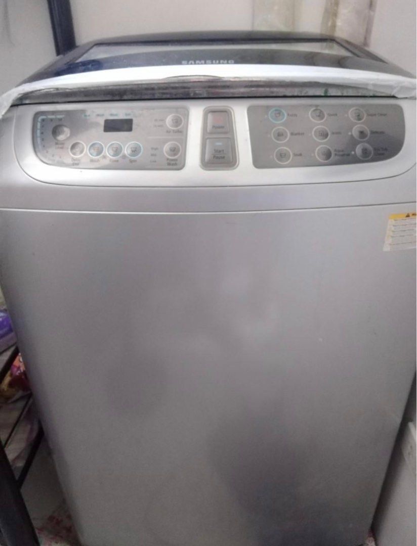 Samsung wobble washing machine 12kgs (Category: Washing Machines and Dryers) located in Quezon. Submitted by chanel81 (Listing ID 1043154677, Image 3). Description: very good used condition fully automatic washing machine 12kgs. scratches and signs of use but otherwise in great condition. orig price at P28k, used occassionally only for 4yrs because bring most clothes to metropole instead. used mostly for baby clothes on occassion only. rfs: need 