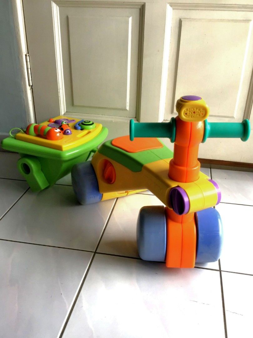 Tomy toddle top n ride walker