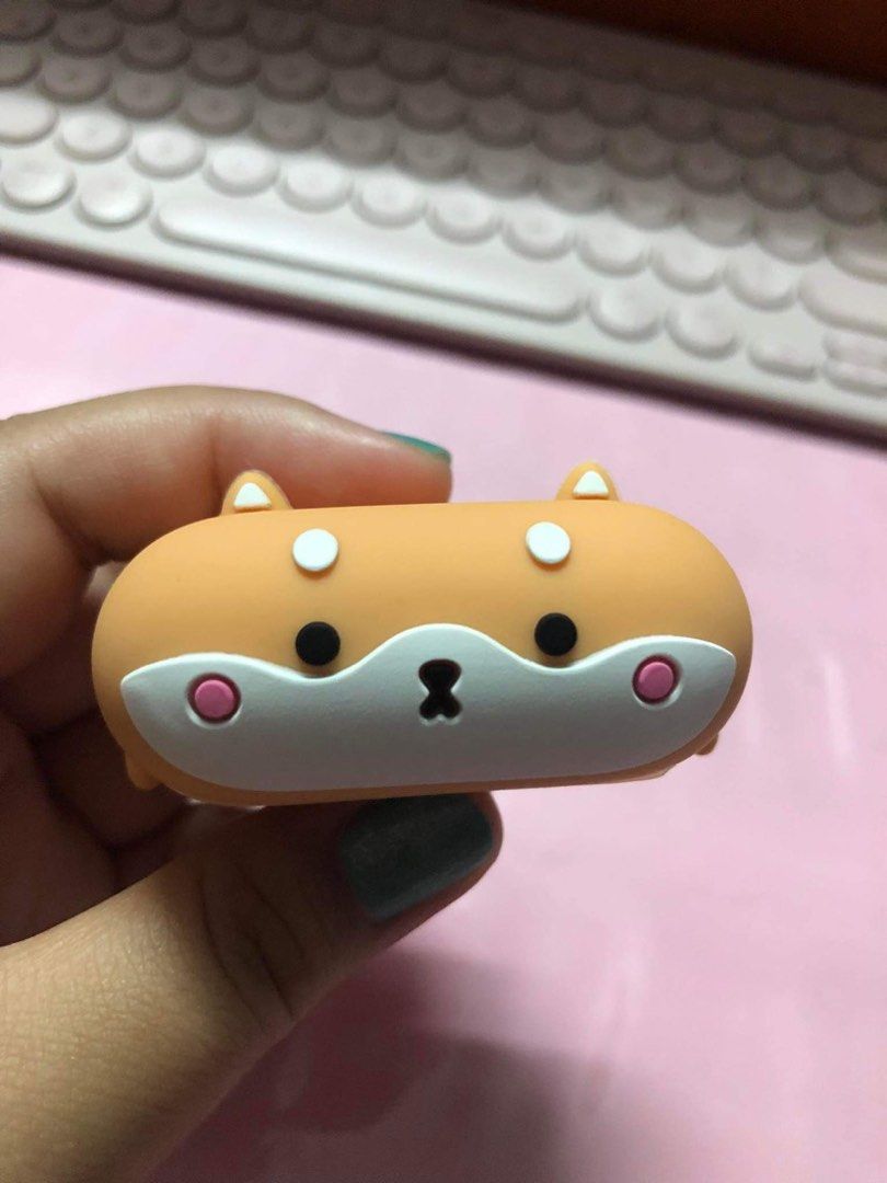 Airpods 3 case (Category: Cases & Sleeves) located in Quezon City. Submitted by aychie (Listing ID 1195735970, Image 1). Description: Selling my airpods 3rd gen corgi case Super cute No issues Loc: Fairview QC .