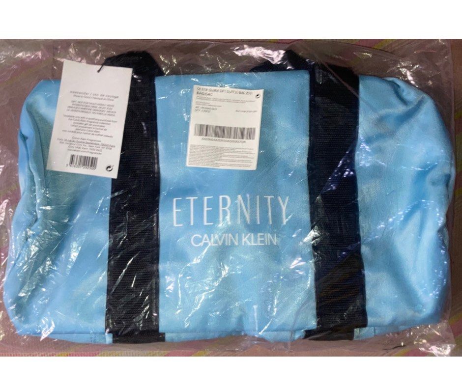 Eternity by Calvin Klein Blue Duffle Weekender Bag (Category: Sling Bags) located in Manila. Submitted by racowan (Listing ID 1195696647, Image 2). Description: Good for gifting Weekender Bag Duffle Bag Color is Sky Blue .