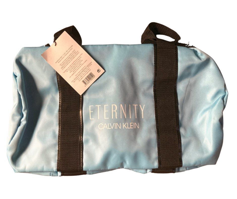 Eternity by Calvin Klein Blue Duffle Weekender Bag (Category: Sling Bags) located in Manila. Submitted by racowan (Listing ID 1195696647, Image 3). Description: Good for gifting Weekender Bag Duffle Bag Color is Sky Blue .