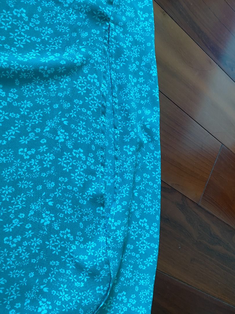 Long Green Floral Skirt (Category: Skirts) located in Muntinlupa City. Submitted by hihelloyehey (Listing ID 1195755252, Image 3). Description: color looks diff in the photos bec of lighting!! feel freee to ask for more photos - with slit - used once.