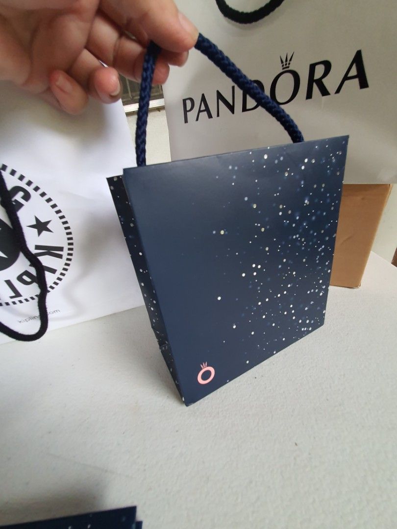 Pandora holiday paper bag blue (Category: Accessory Holder, Box & Organizers) located in Iloilo. Submitted by bricknoir (Listing ID 1195621460, Image 1). Description: lot of 3 pcs 5 x 5 inches pandora paper bag gift bag.