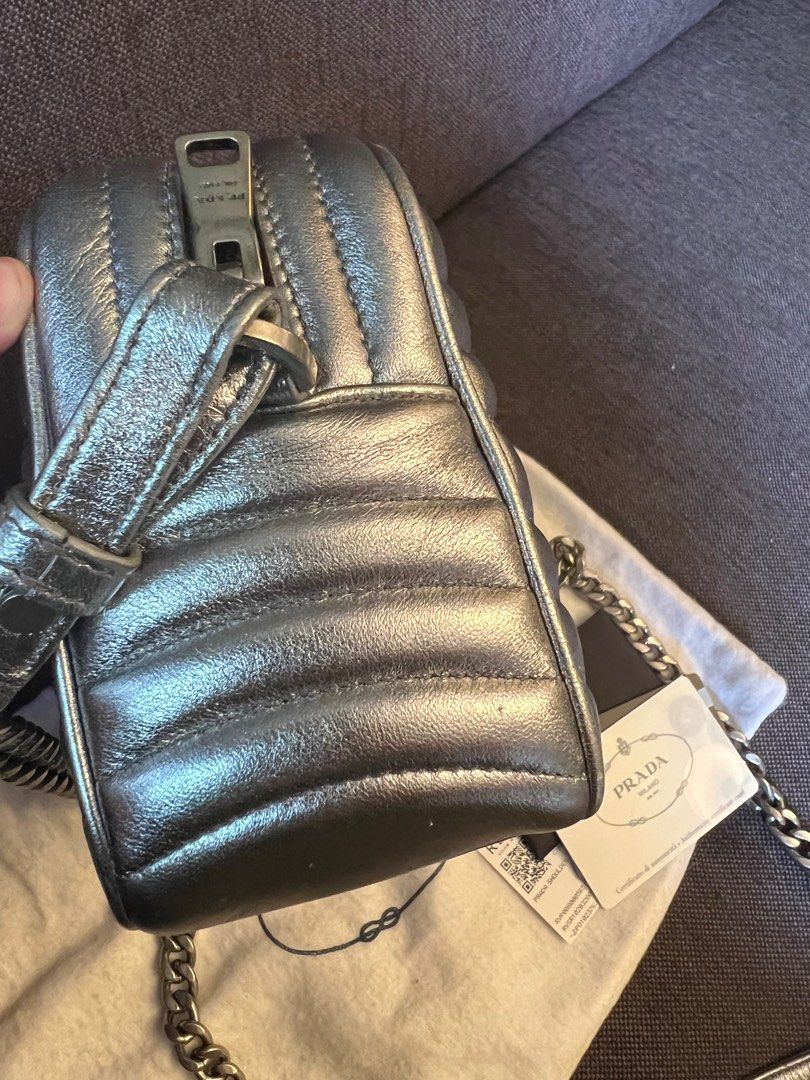 Prada nappa impunture best sale diagramme sling bag