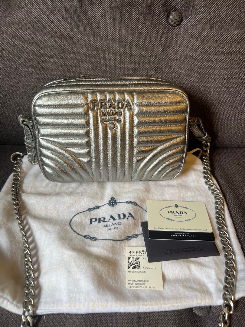 Prada nappa impunture best sale diagramme sling bag