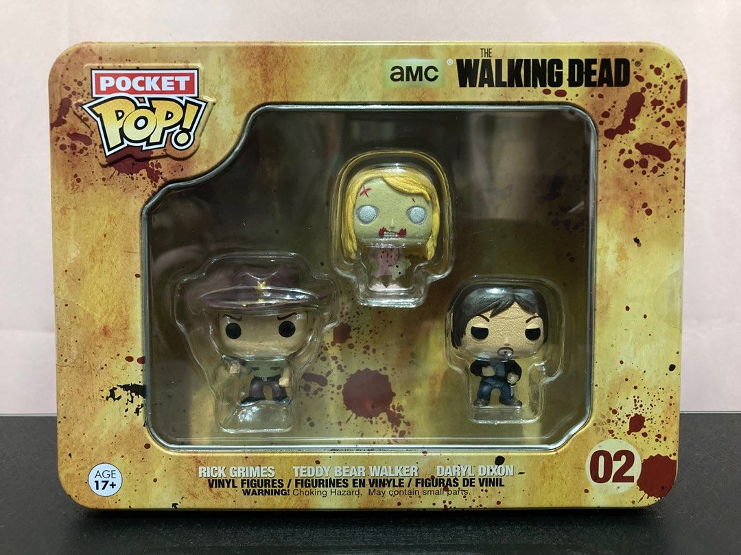 The Walking Dead Pocket Pop Tin (Category: Designer & Blind Box Toys) located in Quezon City. Submitted by g0bblyg33kd0m (Listing ID 1195752410, Image 1). Description: 🧟 The Walking Dead Pocket Pop! 🏷️ PRICE: ₱ 1,200 ✨Brand New 📌Guaranteed Authentic: Funko Brand 🔴 Reason for Selling: Decluttering 💳 Payment: GCash 📸 Actual photos used 📩 DM for more pics! .