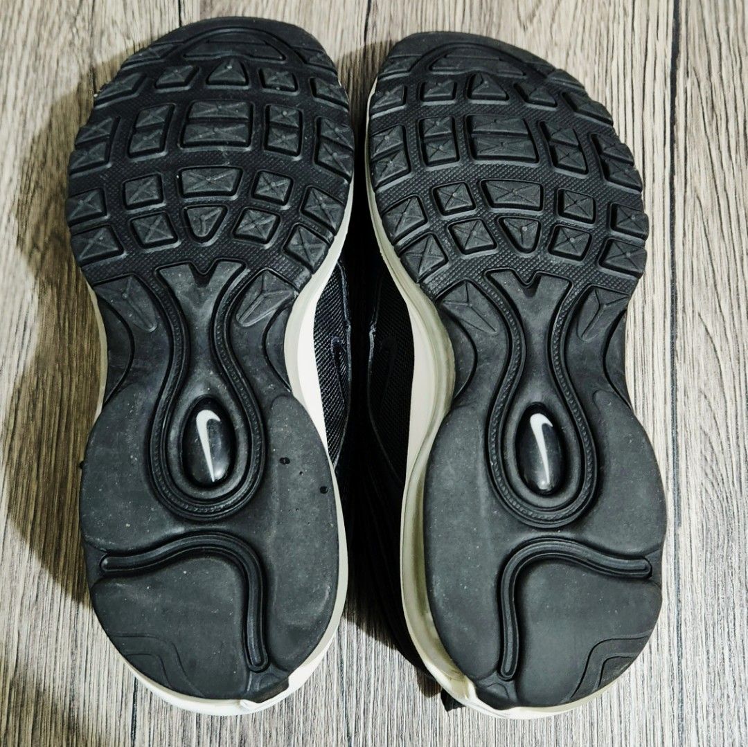 Women's Nike Air Max 97 (Category: Sneakers) located in Mandaluyong City. Submitted by elfc2 (Listing ID 1195800607, Image 3). Description: Item: Nike Air Max 97 * Women's Size US 8 / UK 5.5 / EUR 39 * Reflective stripes * Black * No box * Barely used, bought late 2020 from Zalora Nike but only used a few times * Minimal cleaning only due to dust, no scratches or tear Original price: 7,289 Selling price: 2,000 Notes: * Delivery fee will be booked