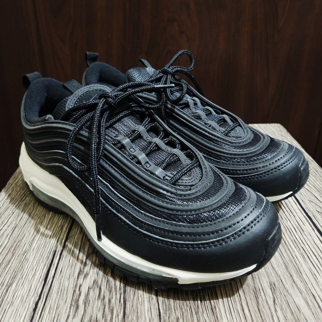 Women's Nike Air Max 97 (Category: Sneakers) located in Mandaluyong City. Submitted by elfc2 (Listing ID 1195800607, Image 1). Description: Item: Nike Air Max 97 * Women's Size US 8 / UK 5.5 / EUR 39 * Reflective stripes * Black * No box * Barely used, bought late 2020 from Zalora Nike but only used a few times * Minimal cleaning only due to dust, no scratches or tear Original price: 7,289 Selling price: 2,000 Notes: * Delivery fee will be booked
