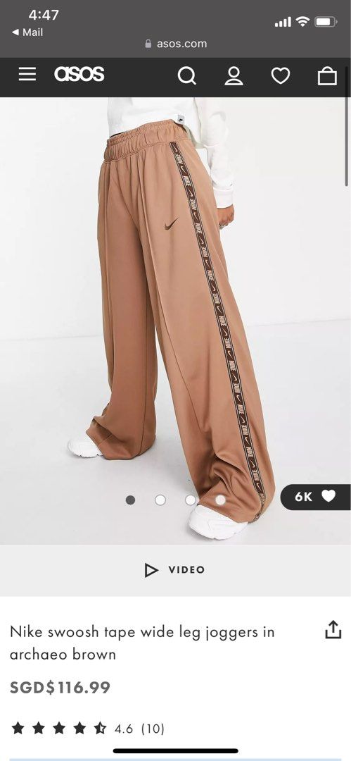 Nike swoosh taped track pants 2025