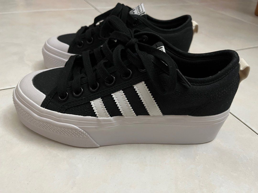 Adidas originals white new arrivals and black nizza trainers