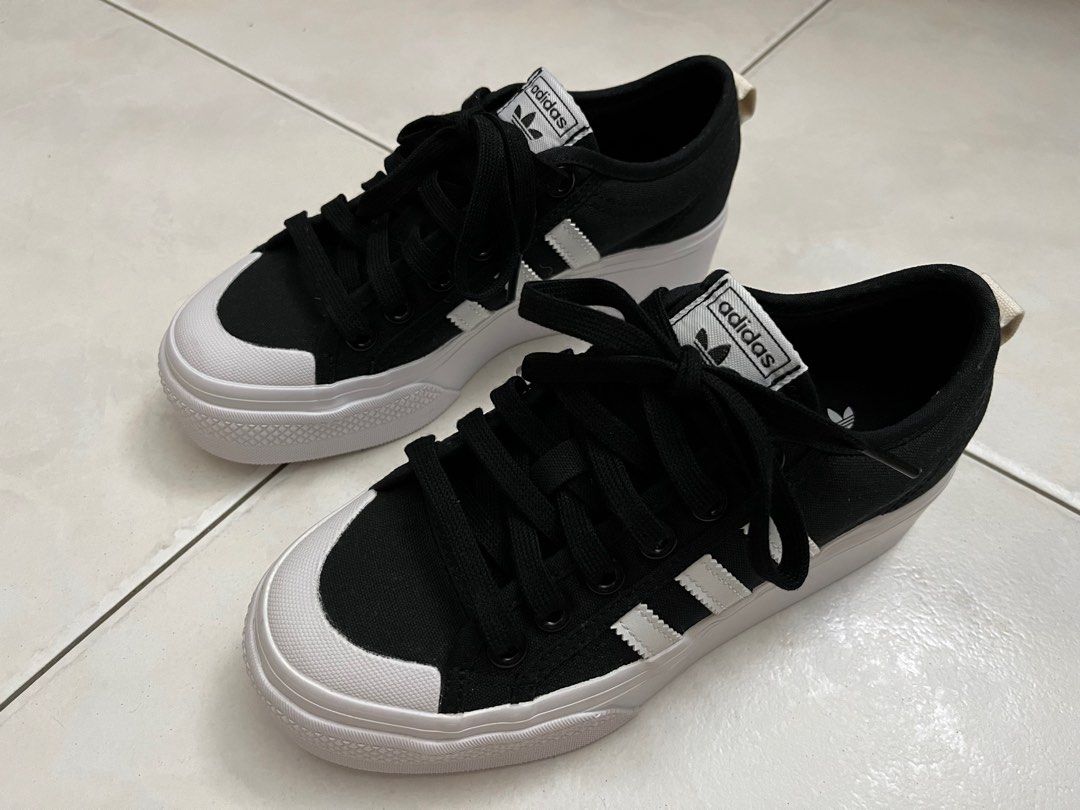 Adidas originals white new arrivals and black nizza trainers