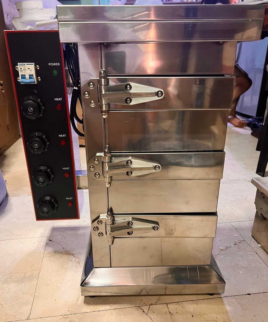 Bibingka Oven Electric (Category: Ovens & Toasters) located in Manila. Submitted by makinaryageneral.merchandise (Listing ID 1200264681, Image 1). Description: 1. Stainless Steel 2. Deck baking oven 3. Removable handle 4. Easy to clean 5. Easy to use 6. Brand new Number of Ovens: 3 Layers Power: 2Kw ; Material: Stainlees Steel Volts: 220V / 50Hz Temperature: 50-300 0C Dimension: 47.5*34*57cm .