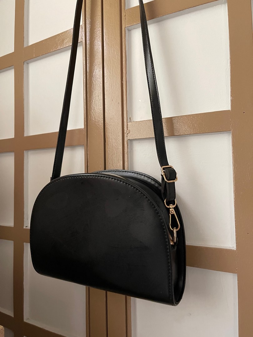Black Moon Bag With A Ring Strap