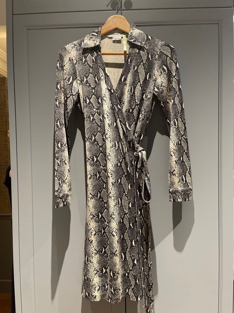 DVF Python Print Dress (Category: Dresses) located in Singapore. Submitted by LE_PreAime (Listing ID 1200330941, Image 1). Description: Diane Von Furstenberg signature jersey wrap dress in python print. DVF sizing for size 2: 86-66-91 Serious buyers only. No exchange or bargaining. Price inclusive of postage within Singapore..