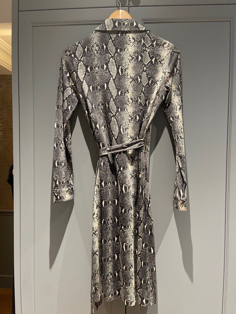 DVF Python Print Dress (Category: Dresses) located in Singapore. Submitted by LE_PreAime (Listing ID 1200330941, Image 2). Description: Diane Von Furstenberg signature jersey wrap dress in python print. DVF sizing for size 2: 86-66-91 Serious buyers only. No exchange or bargaining. Price inclusive of postage within Singapore..