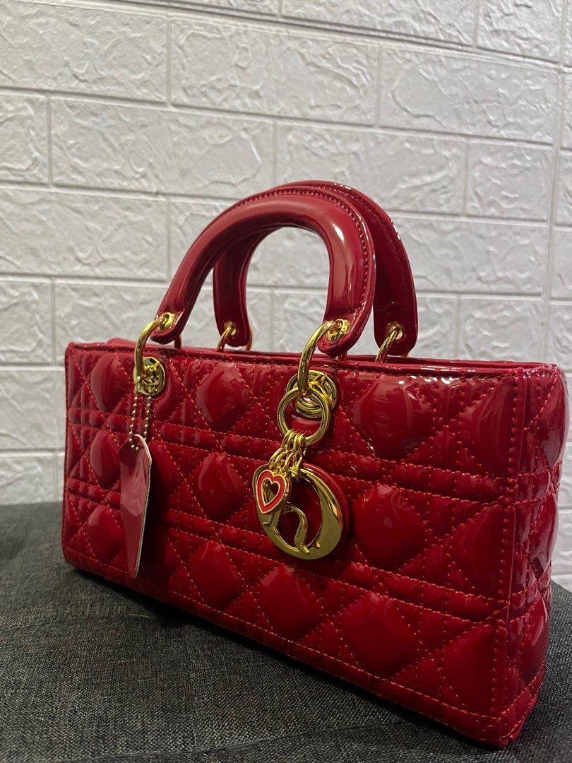 Red quilted handbag store