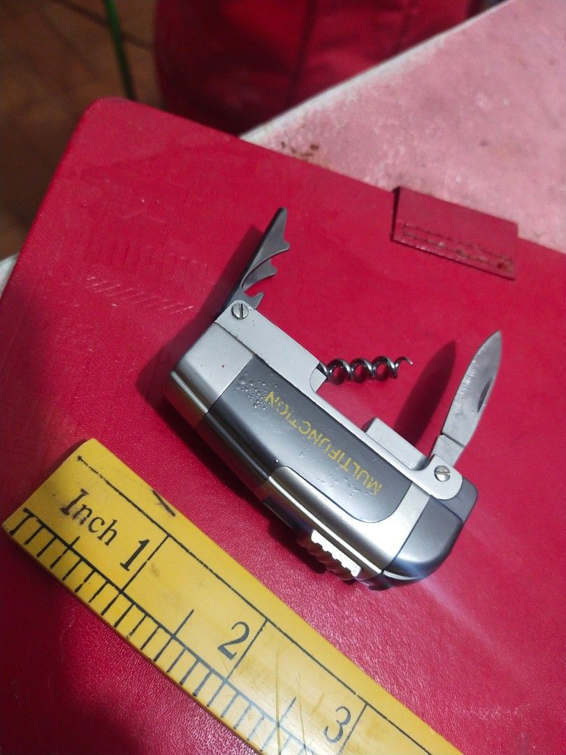 Multi Function Pocket Survival Set/4 uses/Only 3 inches long (Category: Luxury Accessories) located in Del Monte. Submitted by zurckram777 (Listing ID 1200394920, Image 1). Description: Multi-function pocket survival tool. Only 3 inches long. Weighs only about 100 grams. Mini-knife,bottle opener,corks-screw,lighter. The lighter needs fuel to activate it. Bahala na po yung buyer mag load ng fuel. In VG cond. (oro cab,dr.# 2).