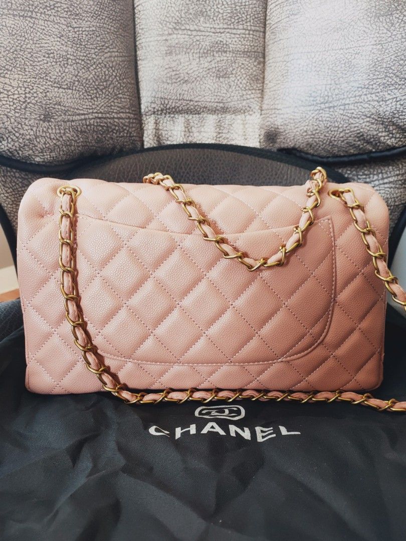 Preloved Double flap chanel (Category: Luxury Bags & Wallets) located in Cebu City. Submitted by day.98 (Listing ID 1200259732, Image 2). Description: from japan surplus caviar skin leather large size no flaws with dust bag.