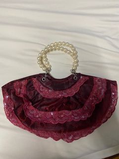 Red bag in pearl handle from KSA