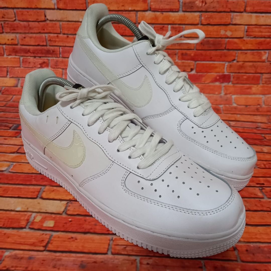 white and purple jordans 11