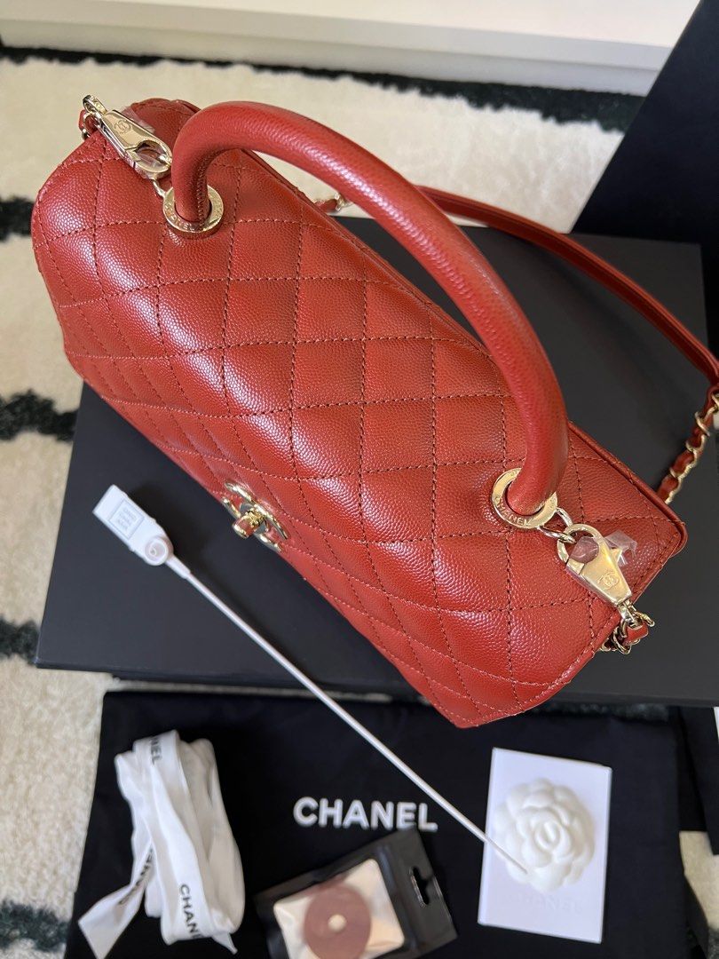 Luxury Helsinki - Chanel Medium Coco Handle Bag in Orange