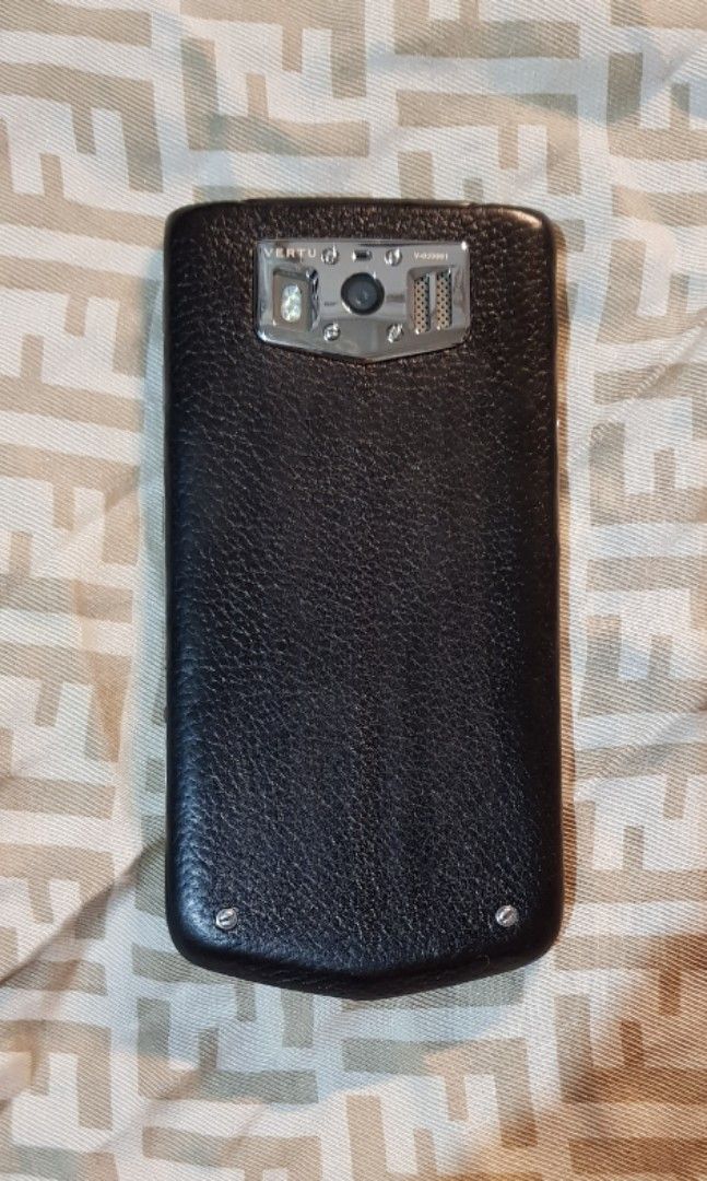 Authentic Vertu Constellation V 2013 (Category: Early Generation Mobile Phones) located in Manila. Submitted by snephysephy (Listing ID 1202064732, Image 2). Description: -No box. Inclusion is only a generic Nokia fast charger. -For detailed specs refer to this: https://m.gsmarena.com/vertu_constellation_2013-5868.php -Titanium Body -Full Sapphire Screen -Ruby Concierge button (no longer have access) -Working with Smart sim (tested) -Cannot updat