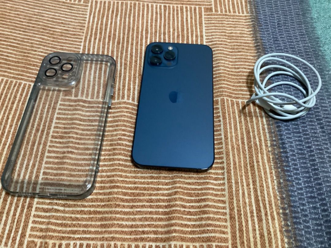 iPhone 12 Pro max (Category: iPhone 12 Series) located in San Juan City. Submitted by michaelarcalas1983 (Listing ID 1202128438, Image 2). Description: 128 GB and 11 months used but receipt were already misplaced. Guaranteed no scratch nor dent. I just changed my phone to iPhone 14 pro max. I can give my 5 almost new casing for free. Package includes mobile phone, 5 casing, cable charger..