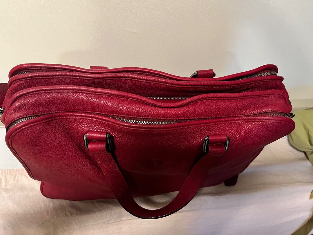 Red leather weekend bag top