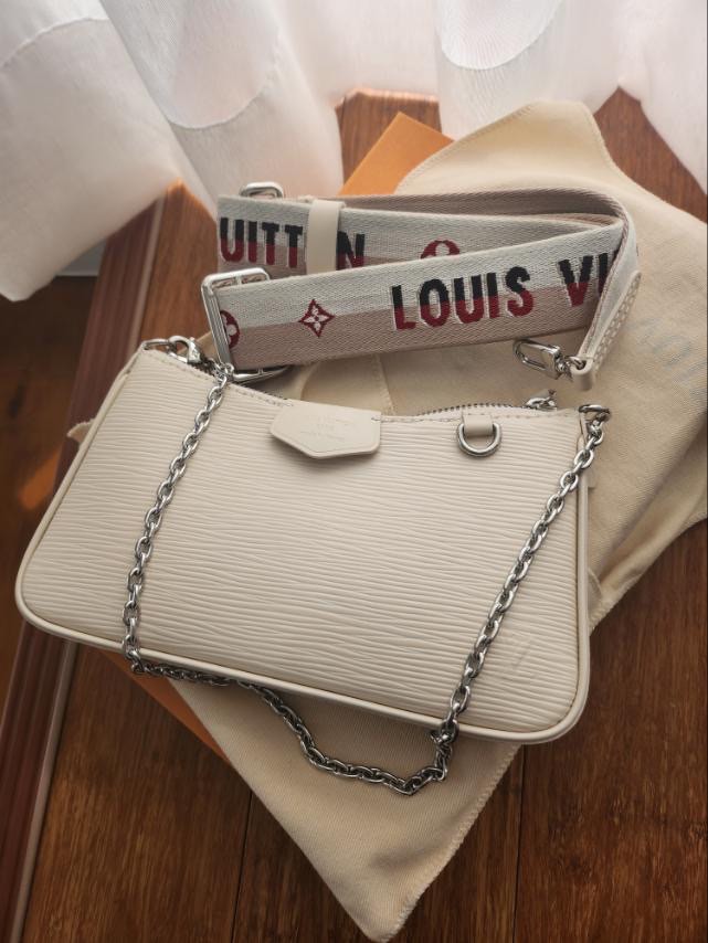 Louis Vuitton Easy Pouch On Strap in Crème, Luxury, Bags & Wallets on  Carousell