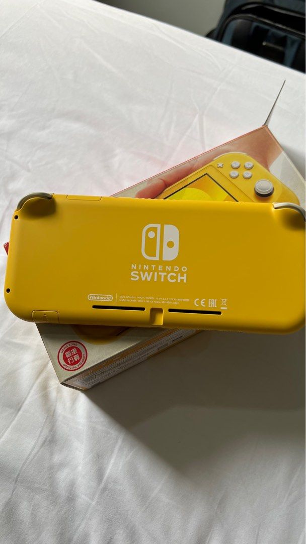 Nintendo Switch Lite Yellow, Video Gaming, Video Game Consoles ...