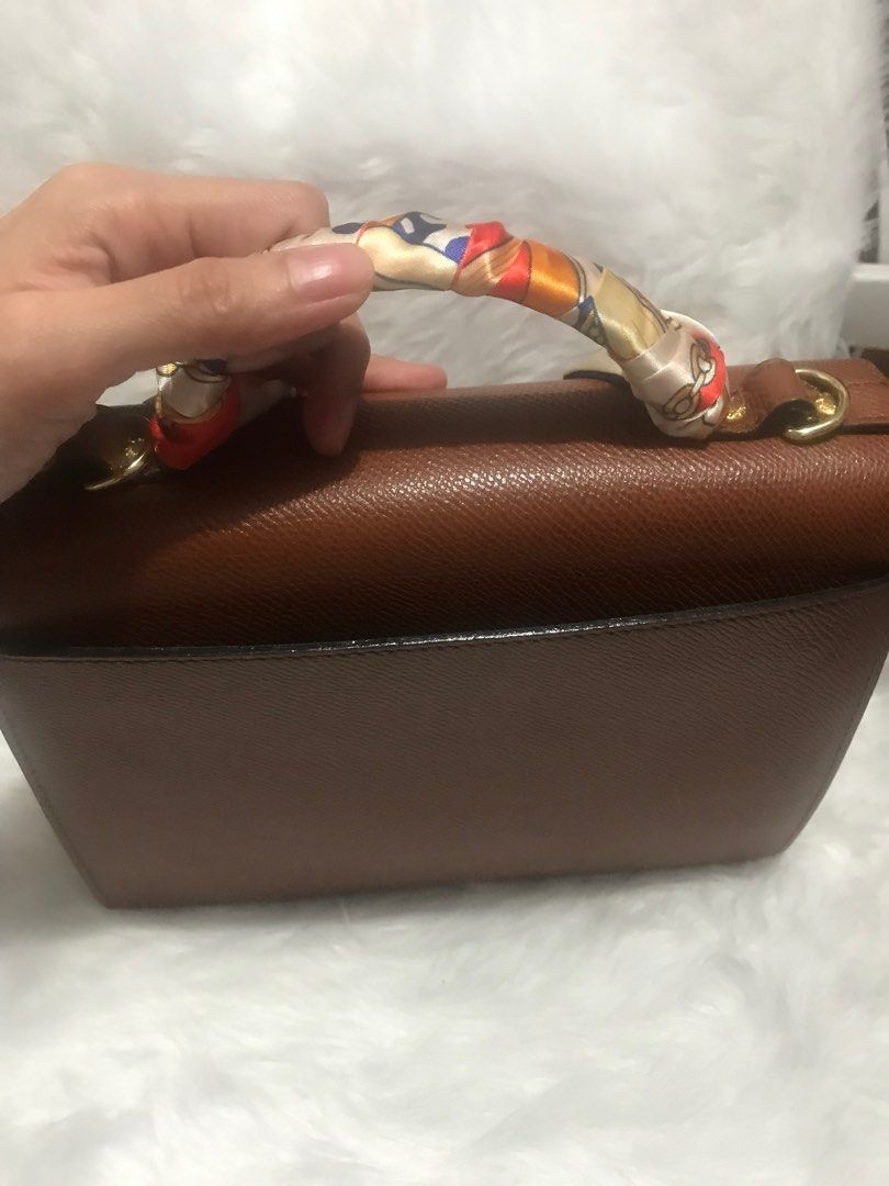 Renoma 2-way (Category: Luxury Bags & Wallets) located in Paranaque City. Submitted by hyccollectionz (Listing ID 1202116463, Image 3). Description: preloved, may signs of used sa loob,.