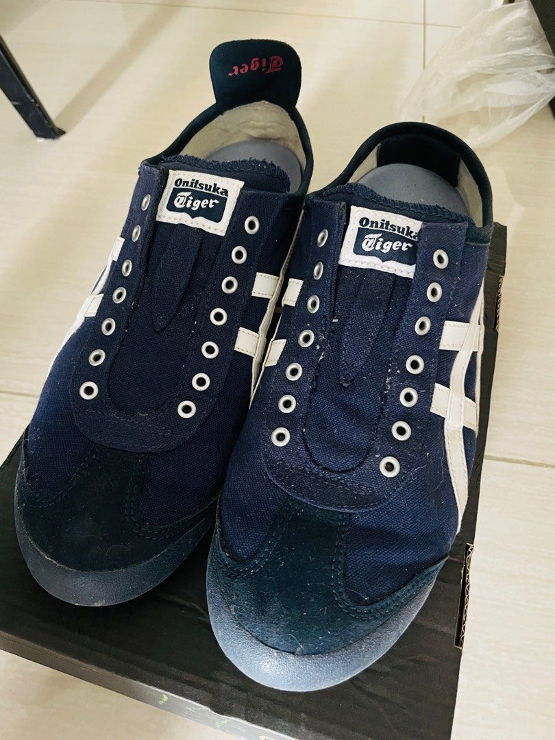 Tiger Onitsuka to clear (Category: Sneakers) located in Singapore. Submitted by iamvincentsim (Listing ID 1202071927, Image 1). Description: Barely used Tiger Onitsuka shoes. - Sz 42.5 Bought it wore a couple of times and due to medical condition, I can’t wear anymore hence selling on a cheap..