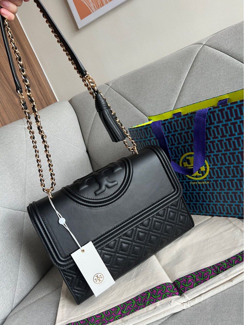 Tory Burch - Fleming Convertible Shoulder Bag (Category: Luxury Bags & Wallets) located in Pasig City. Submitted by outletfindsbyara (Listing ID 1192646232, Image 1). Description: - pasabuy, arrives in a week upon placement of order - 50% dp required - sourced from California, US (ontario mills outlet) - authentic (with money-back guarantee if proven fake via Entrupy authentication) - with complete inclusions .