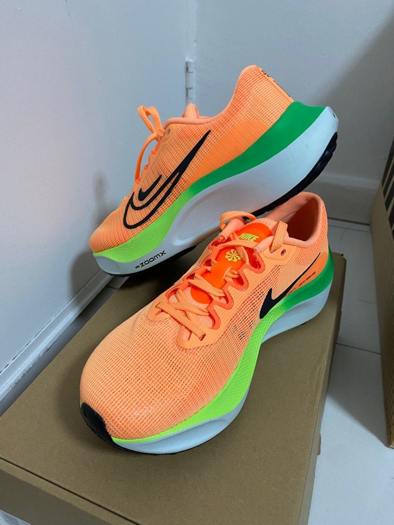 Nike 27 sales womens orange