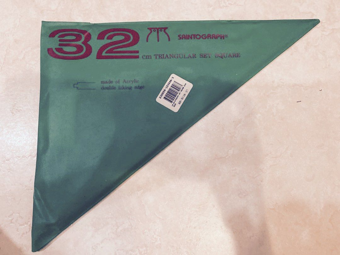 32cm triangular set square (Category: Craft Supplies & Tools) located in Singapore. Submitted by happyfibs (Listing ID 1202305691, Image 3). Description: As per photo Used 1 or 2 times The coins are attached so that the ruler will not touch the paper and smudges your artwork. Can be removed. Can throw in a 30cm metal ruler if you need Let me know .