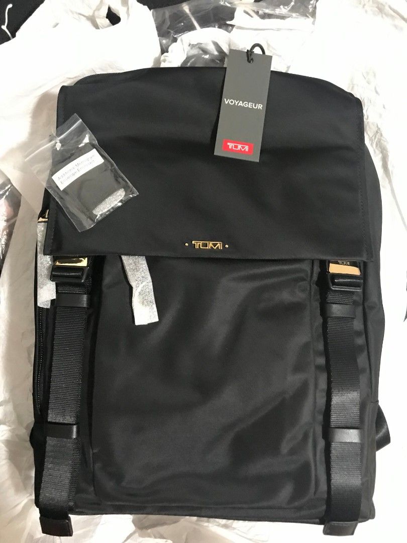 sacha flap backpack tumi 0484710KHK with Khaki, Beige (Khaki) Fashion Its sleek design and versatile features make it perfect for anyone looking for a reliable and practical bag. Backpack by Tumi (USA). Article: