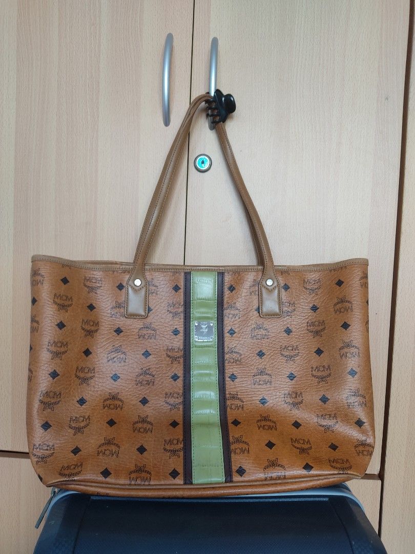 Original MCM bag 💯 (Category: Luxury Bags & Wallets) located in Las Pinas. Submitted by closet_beacecilio (Listing ID 1202378294, Image 1). Description: Letting go of my favorite bag at a very low price. There are some flaws, but can surely be repaired. Sayang cos it's really original, so baka you can look for somewhere for it to get repaired. Very spacious and elegant! RFS: major decluttering.