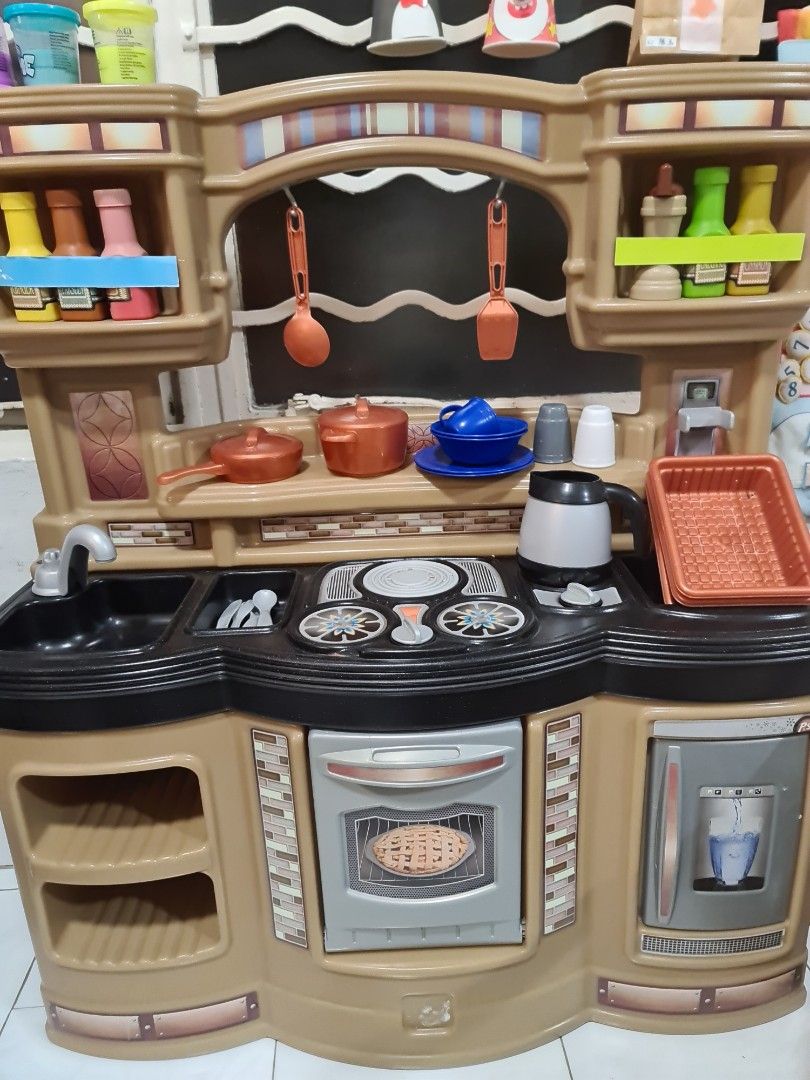 Step 2 kitchen set with apron and chef hat, Hobbies & Toys, Toys & Games on Carousell